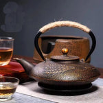 Théière japonaise en fonte avec motifs épis dorés