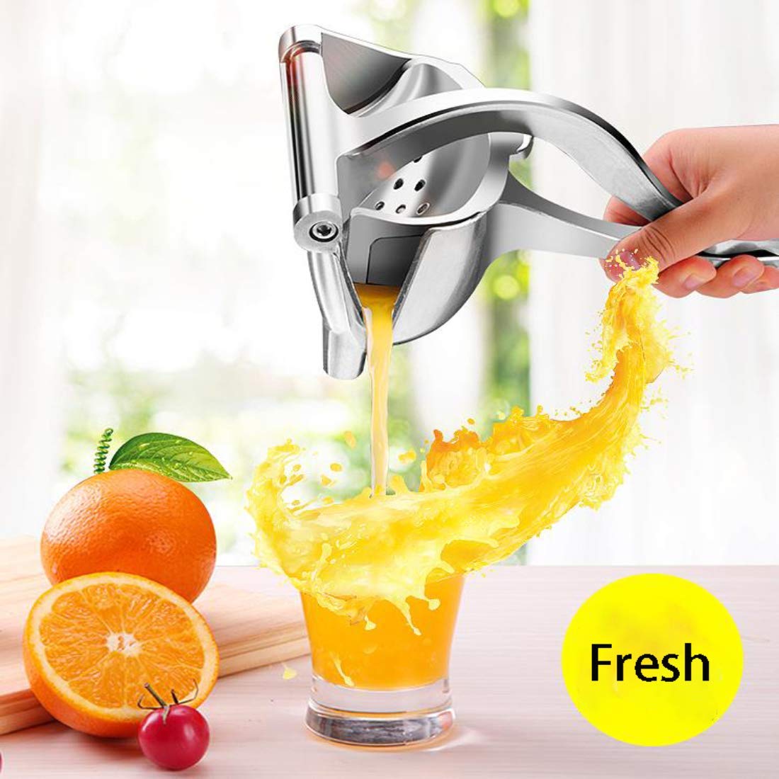 Presse fruits manuel en acier inoxydable - UstensilesCulinaires