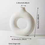 Vase décoratif rond en résine - UstensilesCulinaires