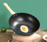 Wok en fonte Antiadhésif - Le coquillage - UstensilesCulinaires